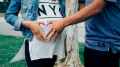 touching pregnant woman's belly