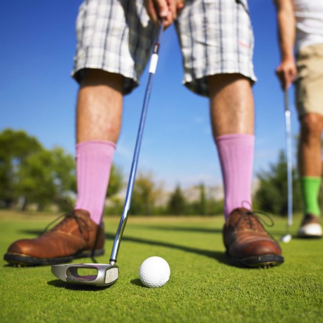 playing golf